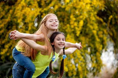 girl getting a piggyback ride