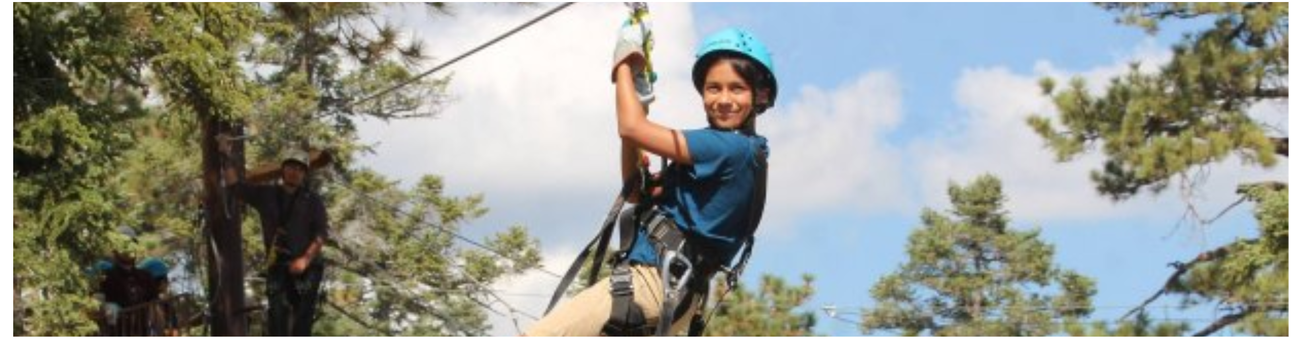 Young boy on a zip line