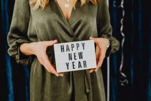 Happy New Year Sign woman in dress