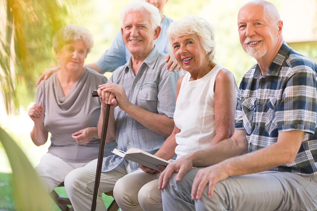 Seniors socializing and being together to improve wellbeing